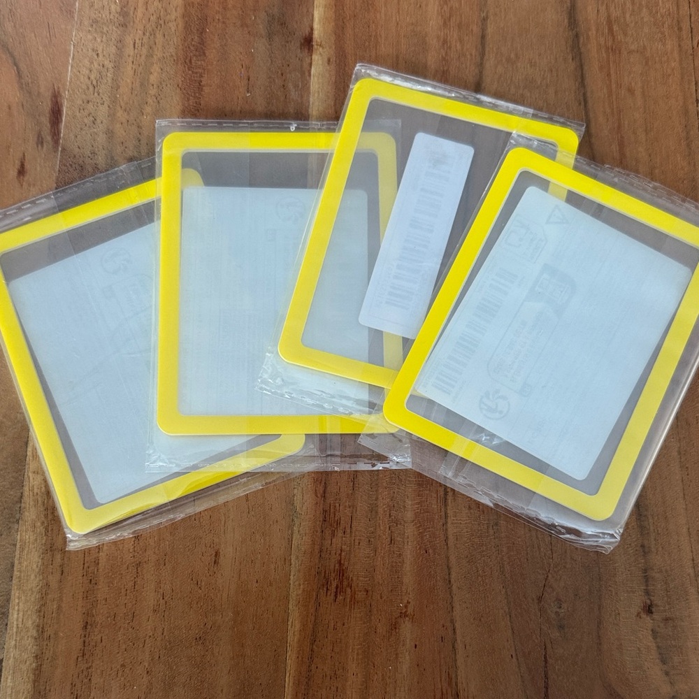 Yellow trading card protectors set of 4